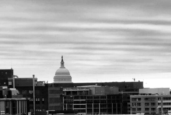 Image of Washington DC with a glimpse of the Capital building
